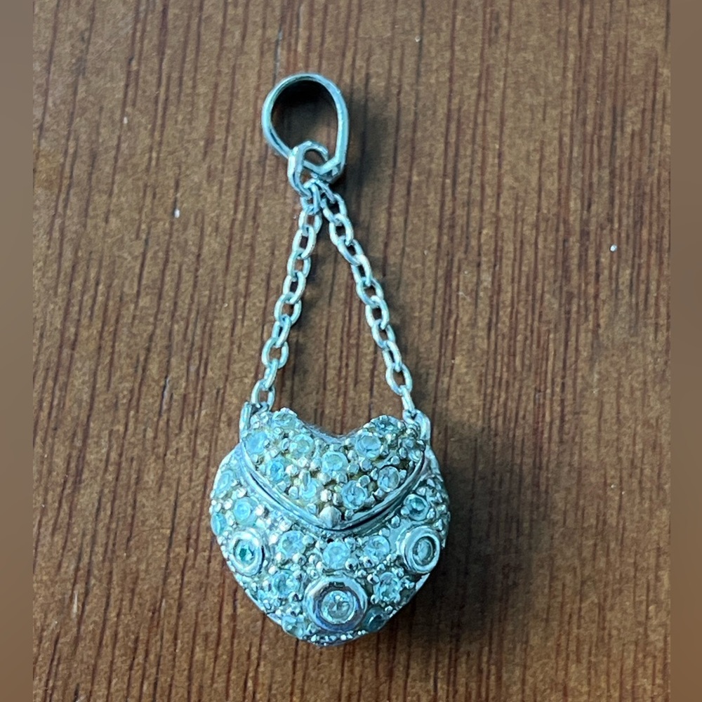 Diamond-crusted sterling silver heart pendant